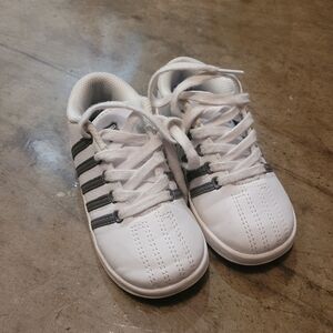 White Sneakers with Black Stripes